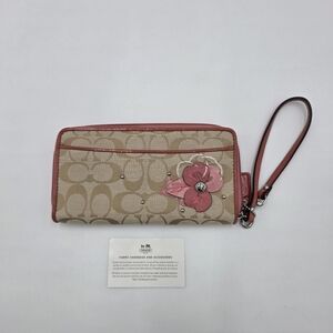 Coach Signature Wristlet with Floral Applique Beige And Pink.